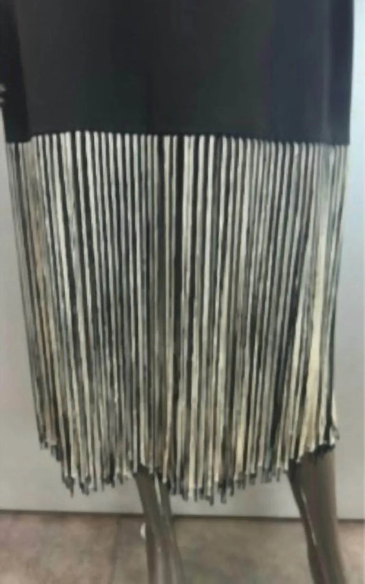 Black dress with black and white fringes at the bottom