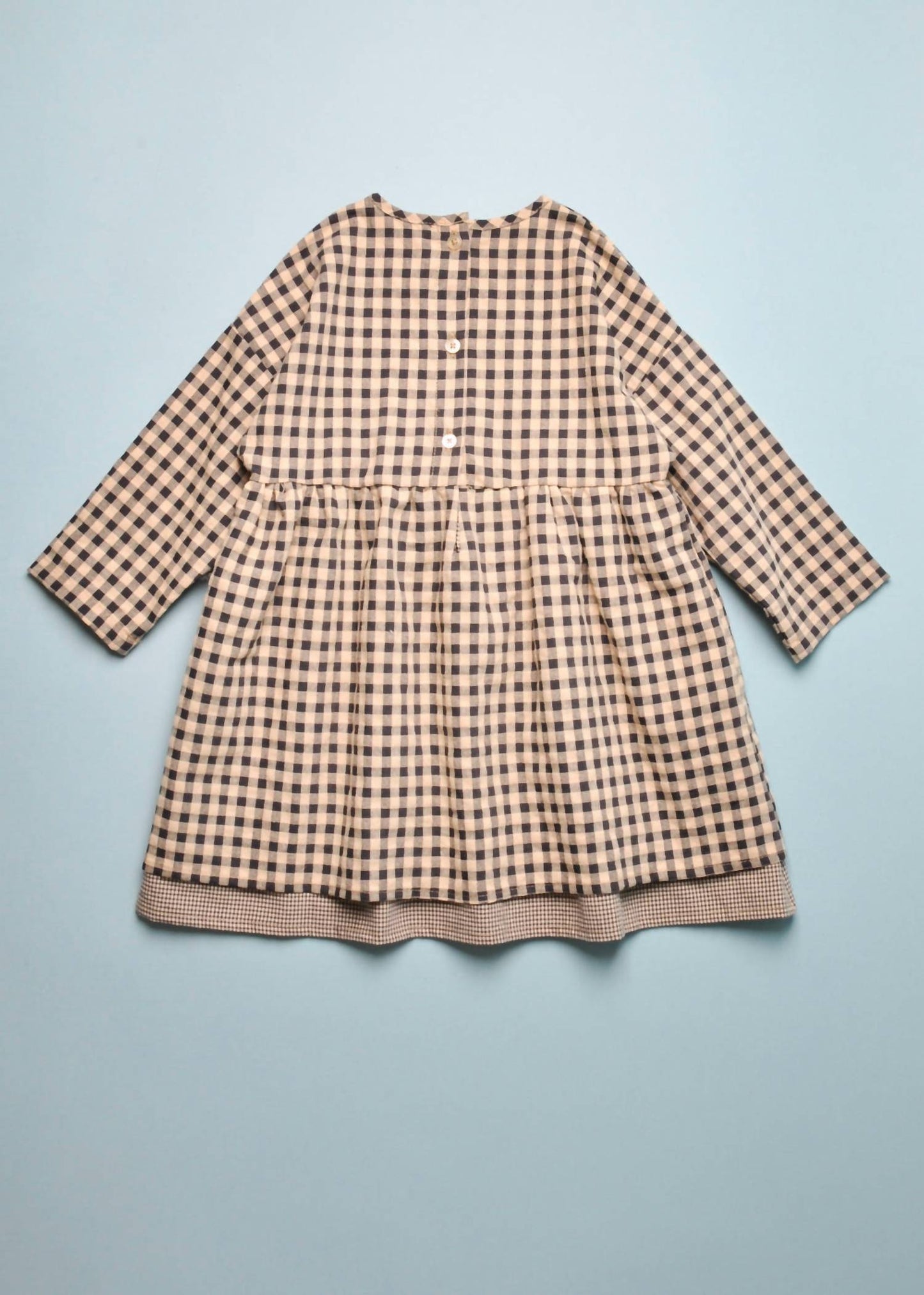 Mädchen-Karo-Kleid