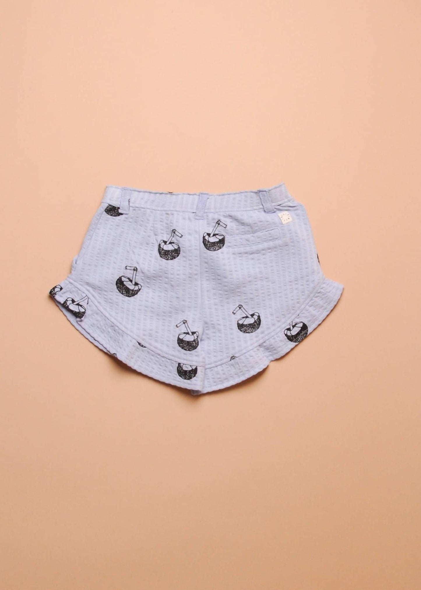 Rüschenshorts für Mädchen mit Kokosnuss-Muster