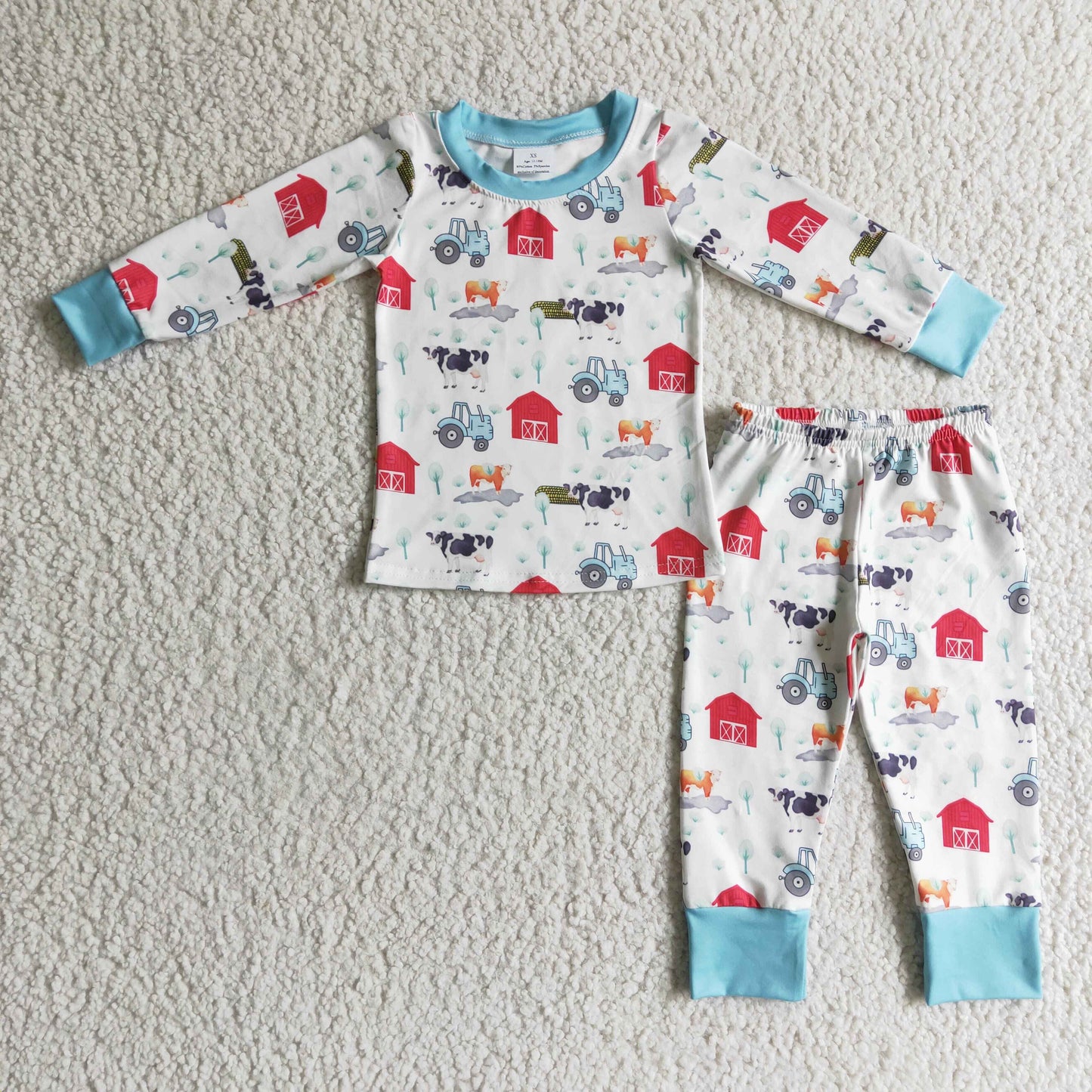 Jungen-Pyjama mit langen Ärmeln und Kuhhof-Aufdruck