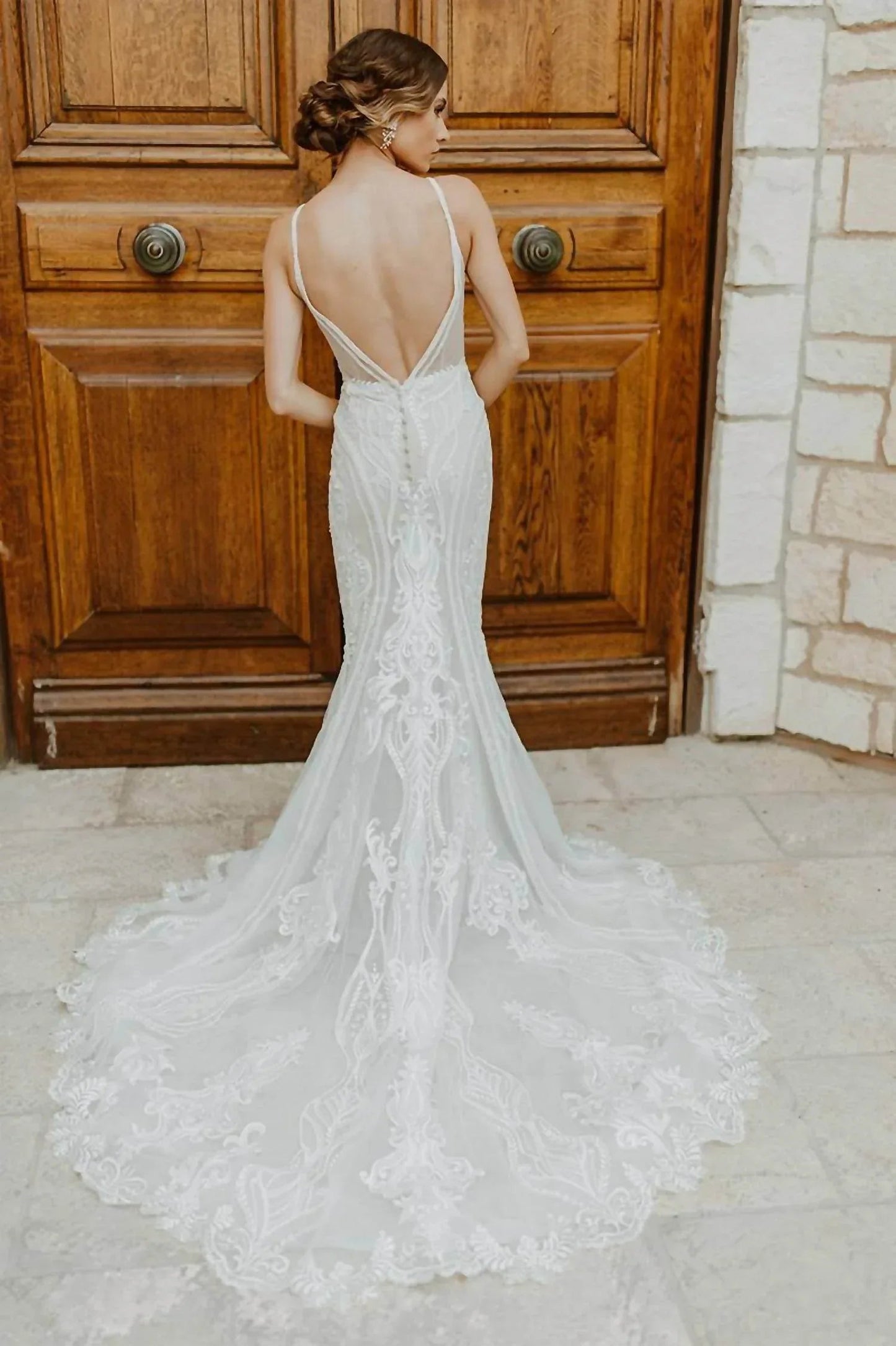 Glamouröses Brautkleid aus Spitze im Fit-and-Flare-Stil