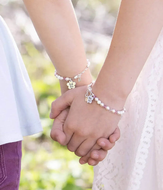 Armband "Große Schwester" aus Sterlingsilber mit Blumenanhänger