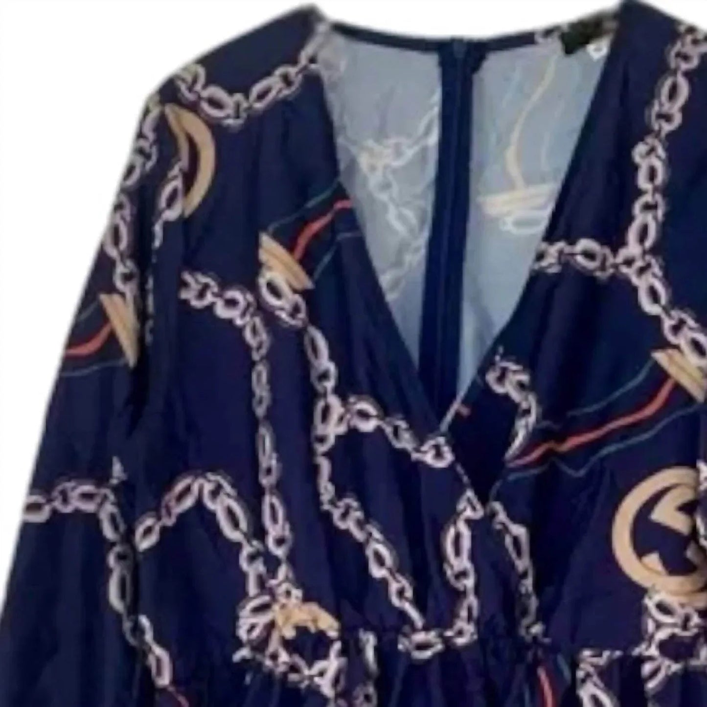Elegantes Damenkleid mit Kettenmuster