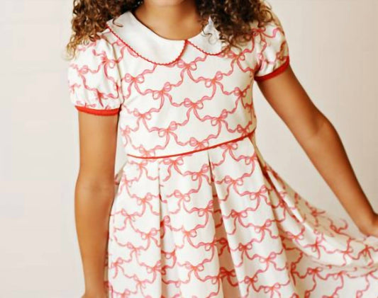 Kinderkleid mit Schleife und Babypfalten