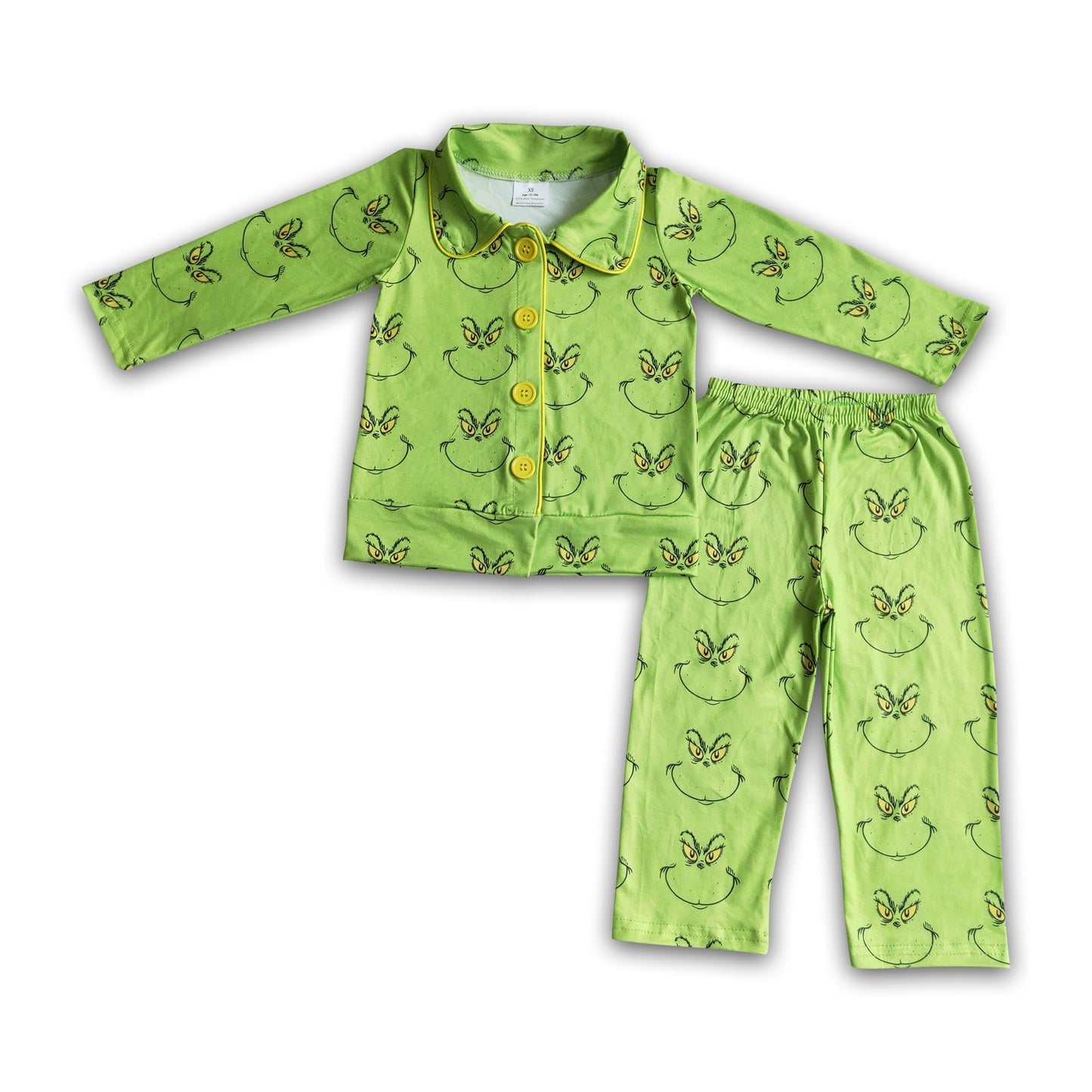 Niedlicher grüner Jungen-Schlafanzug mit Gesicht für Weihnachten
