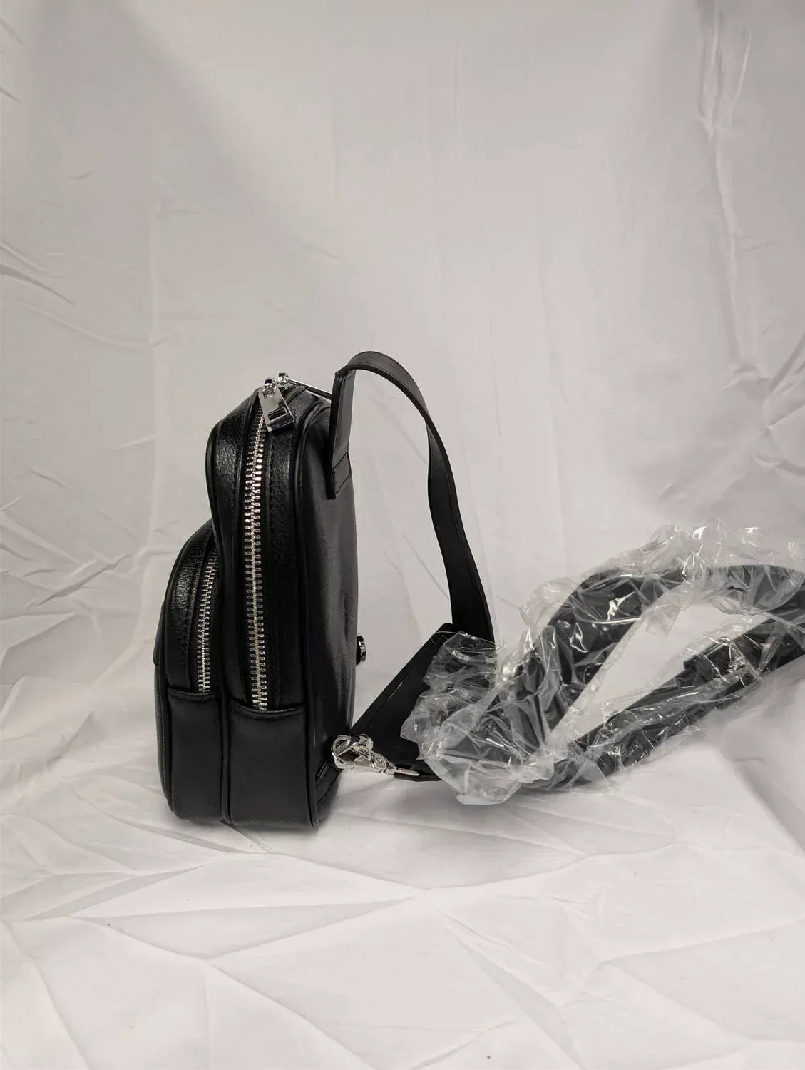 LEATHER SLING PACK BAG