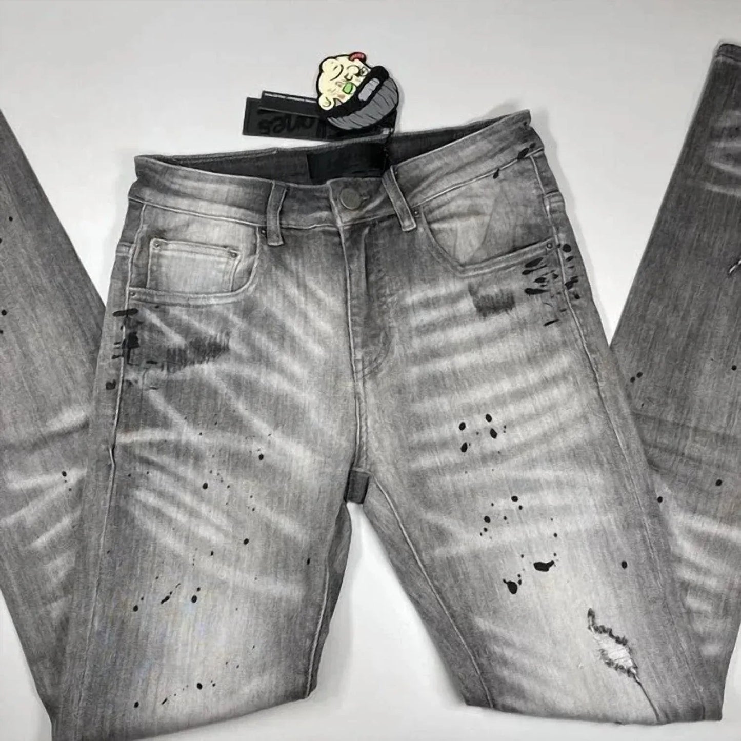 Men’s Paint Splash Two-hole Denim Skinny Jeans