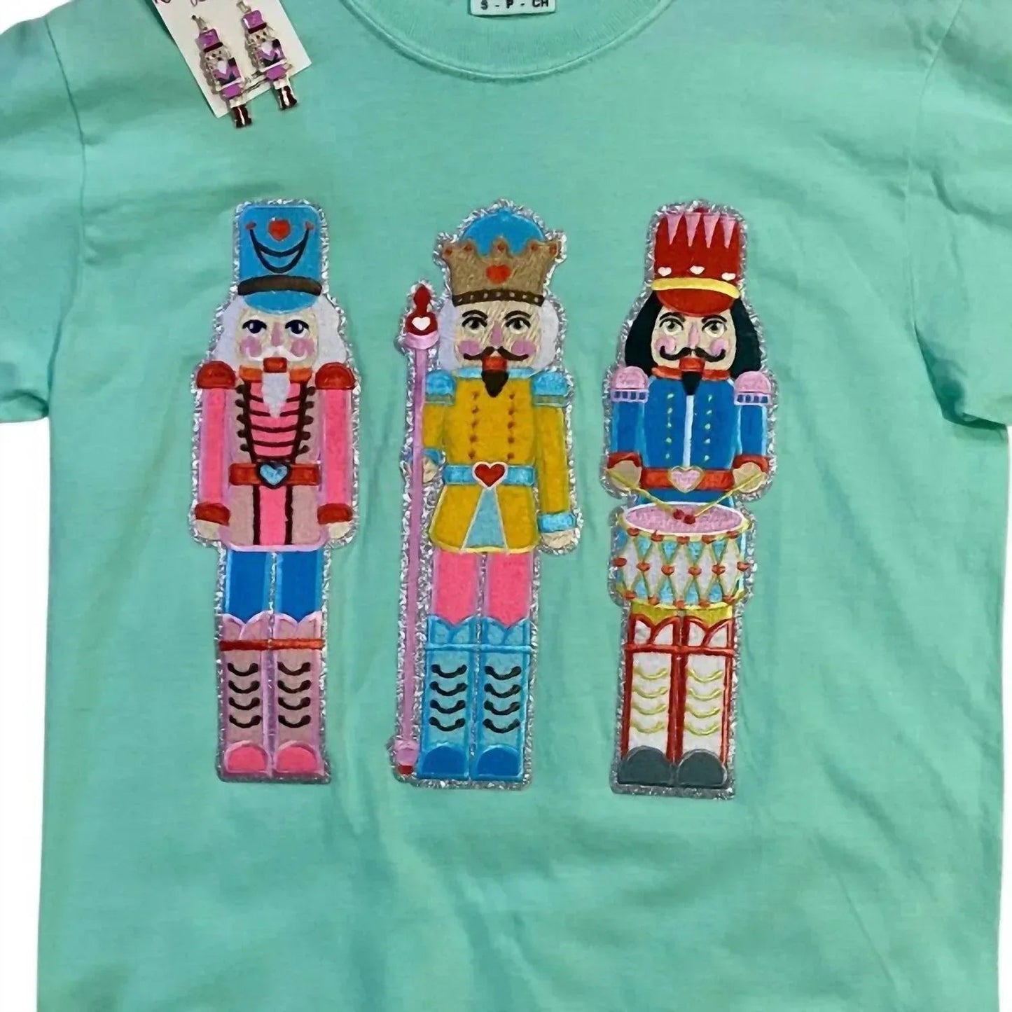 Damen T-Shirt mit Nussknacker-Chenille-Aufnäher