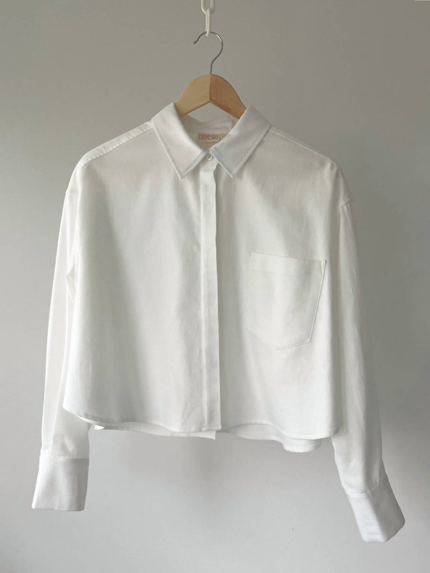 Langärmliges bauchfreies Shirt