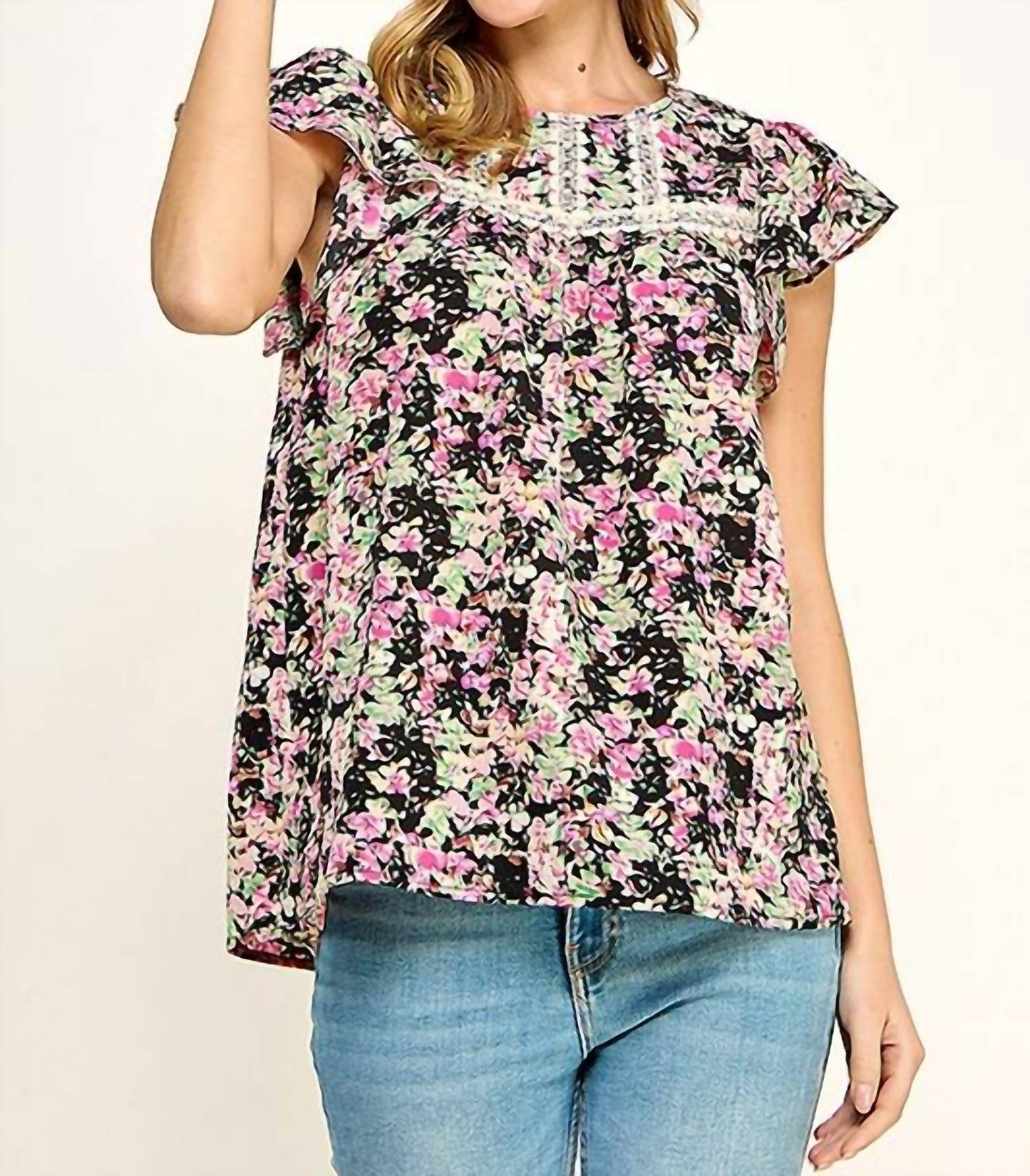 Bluse mit Blumenmuster und Häkelbesatz