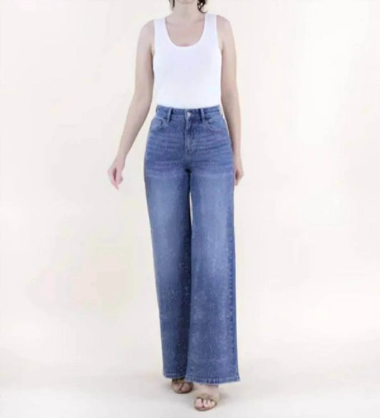 Jeans mit Wirbelmuster, Strasssteinen, hoher Taille und weitem Bein