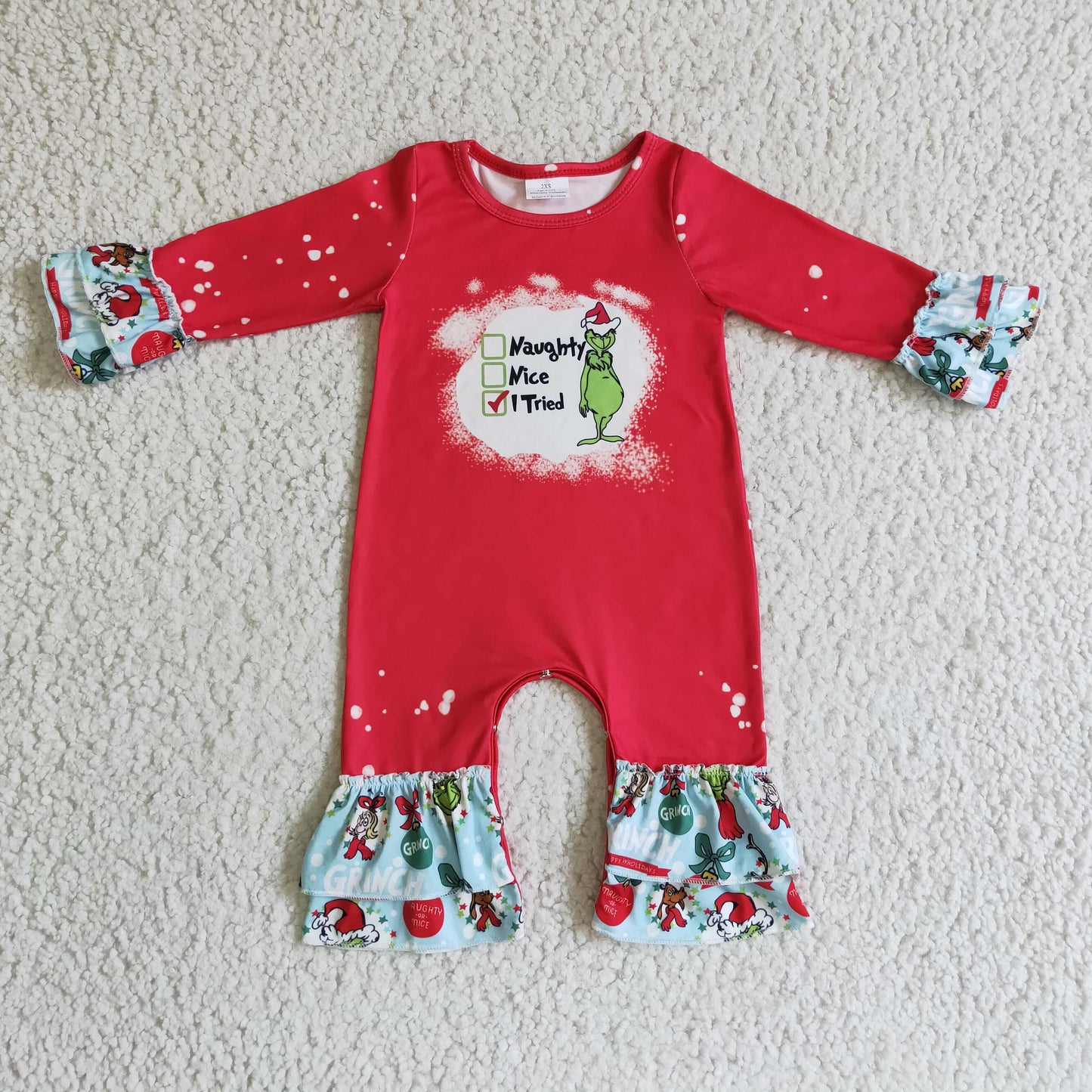 Unartige oder liebe grüne Gesichts-Baby-Mädchen Weihnachts-Strampler