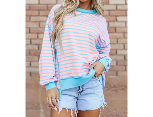 Gestreifter Pullover mit Kontrastbesatz und hohem/tiefem Saum