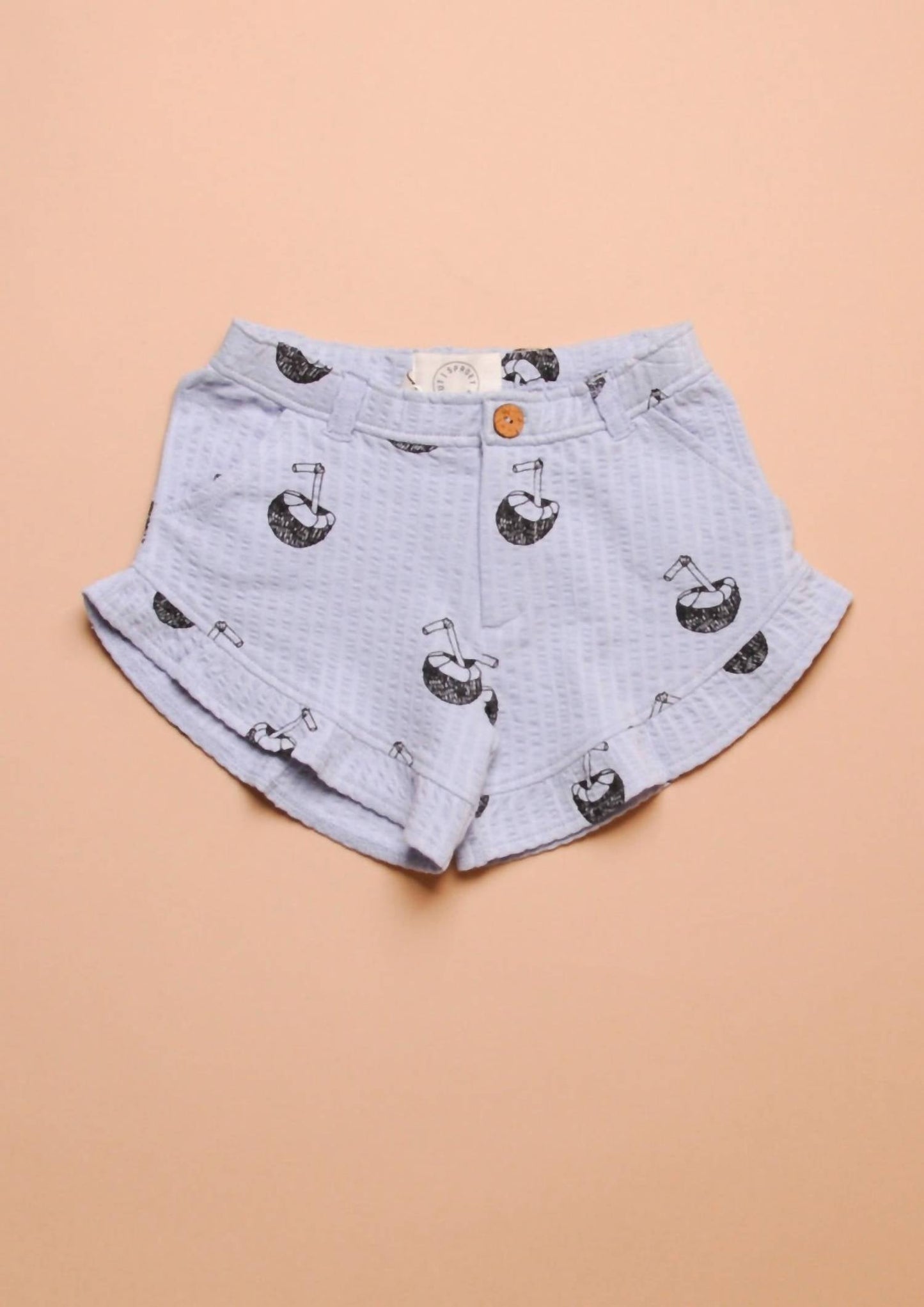 Rüschenshorts für Mädchen mit Kokosnuss-Muster