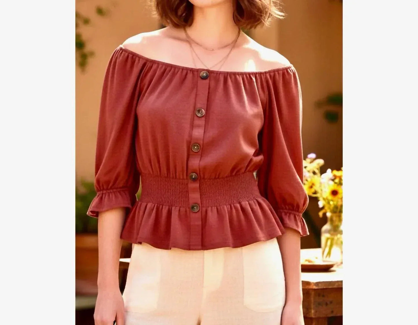 Geknöpfte, taillierte Strickbluse im Boho-Stil